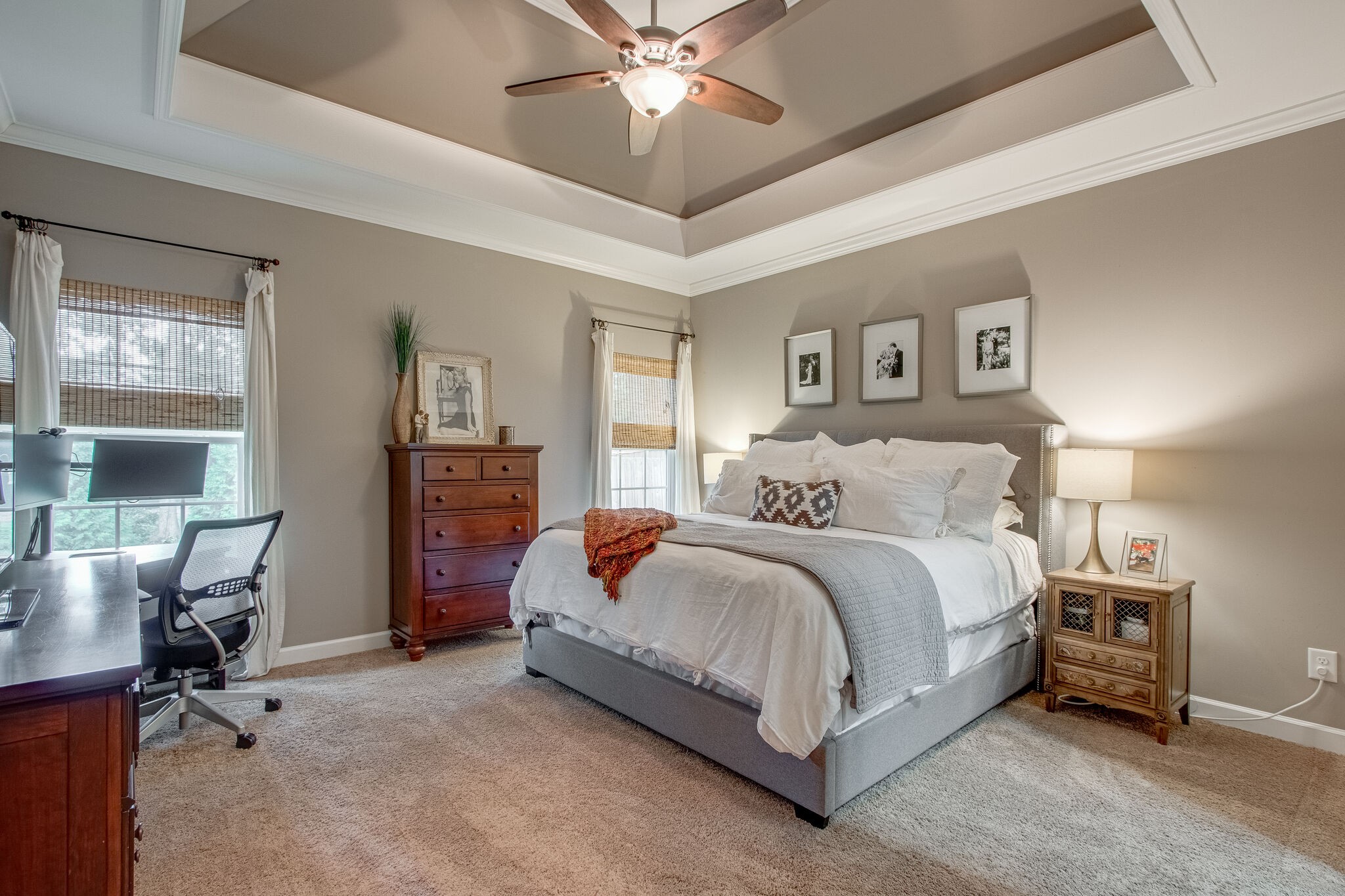 1094 Golf View Way Spring Hill, TN 37174 - Photo 14 of 26 a spacious bedroom with a bed and a chandelier