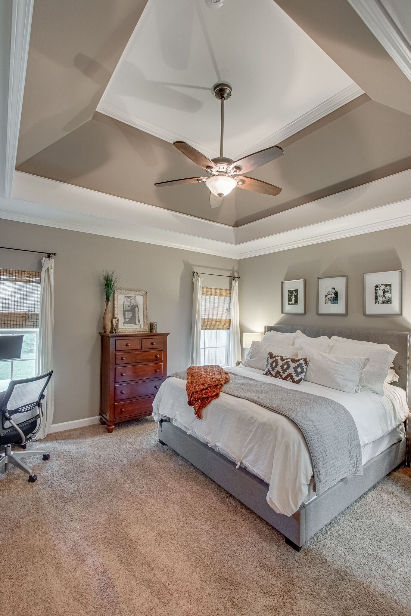 1094 Golf View Way Spring Hill, TN 37174 - Photo 15 of 26 a bedroom with a bed chandelier and a window