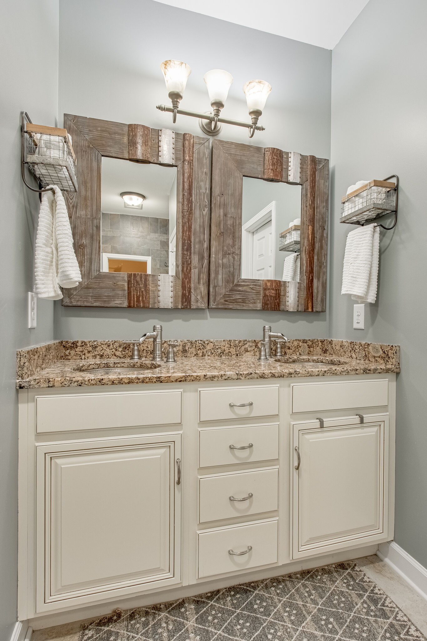 1094 Golf View Way Spring Hill, TN 37174 - Photo 18 of 26 a bathroom with a sink vanity and mirror