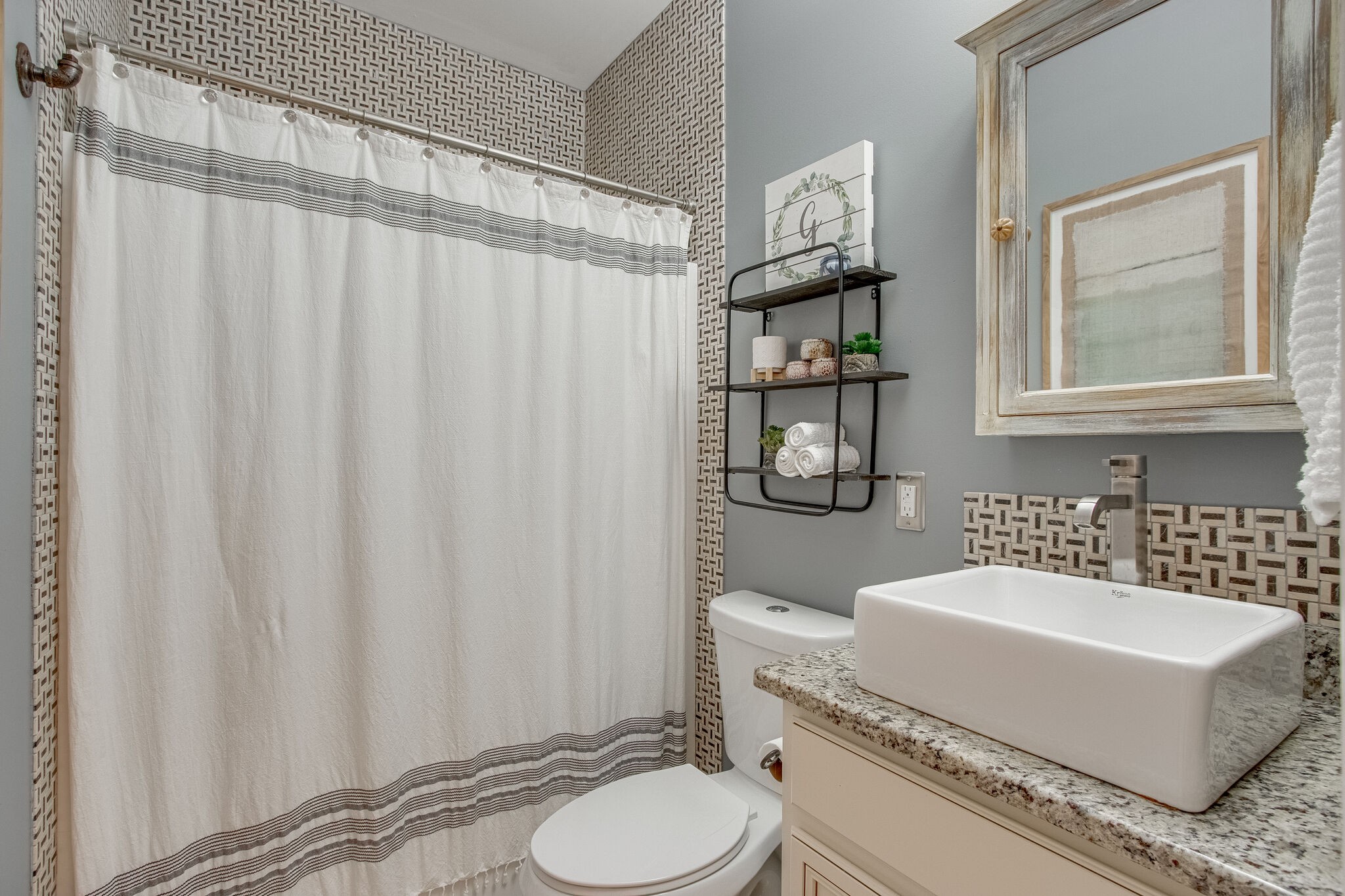 1094 Golf View Way Spring Hill, TN 37174 - Photo 23 of 26 a bathroom with a sink toilet and shower