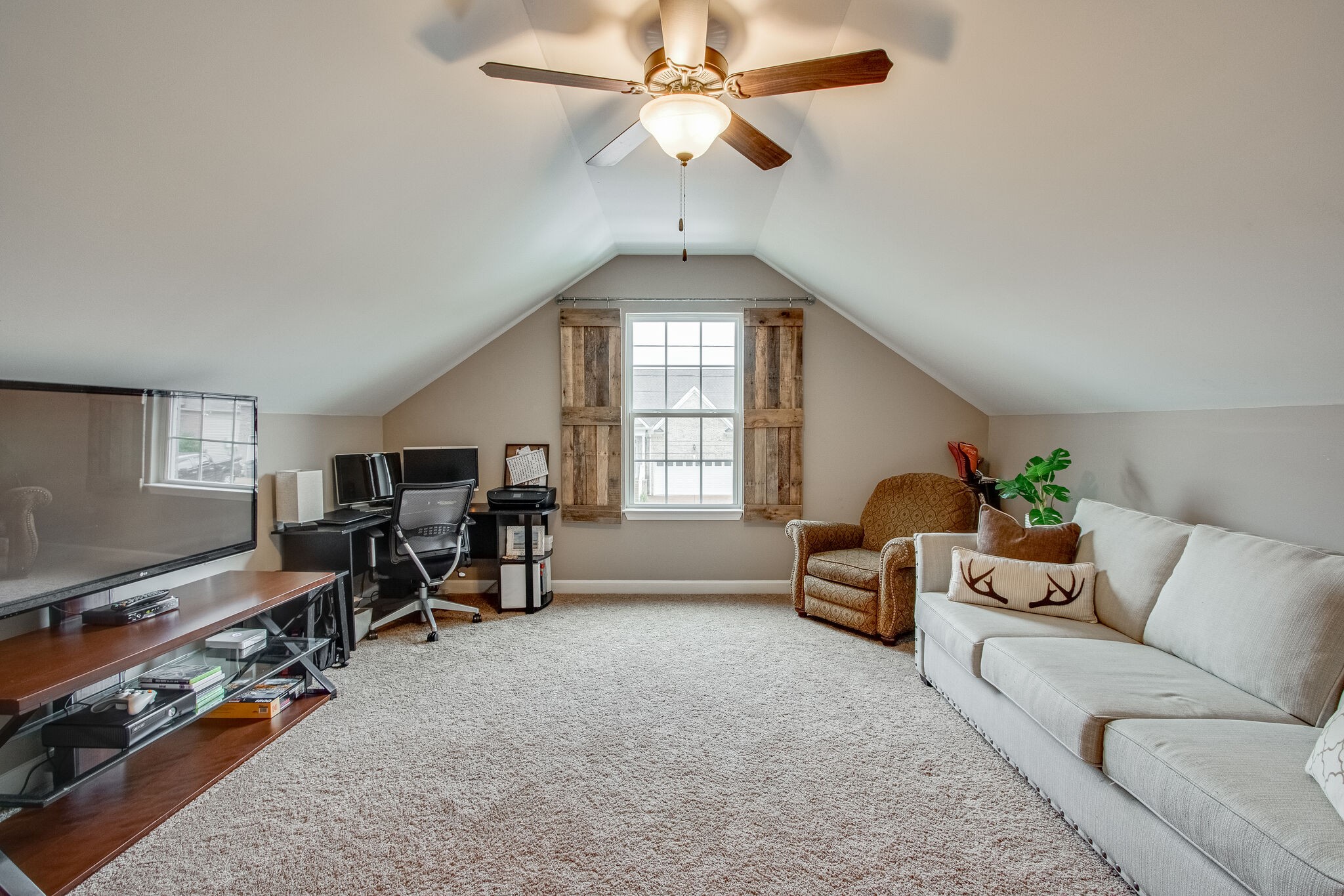 1094 Golf View Way Spring Hill, TN 37174 - Photo 25 of 26 a living room with furniture windows and a flat screen tv