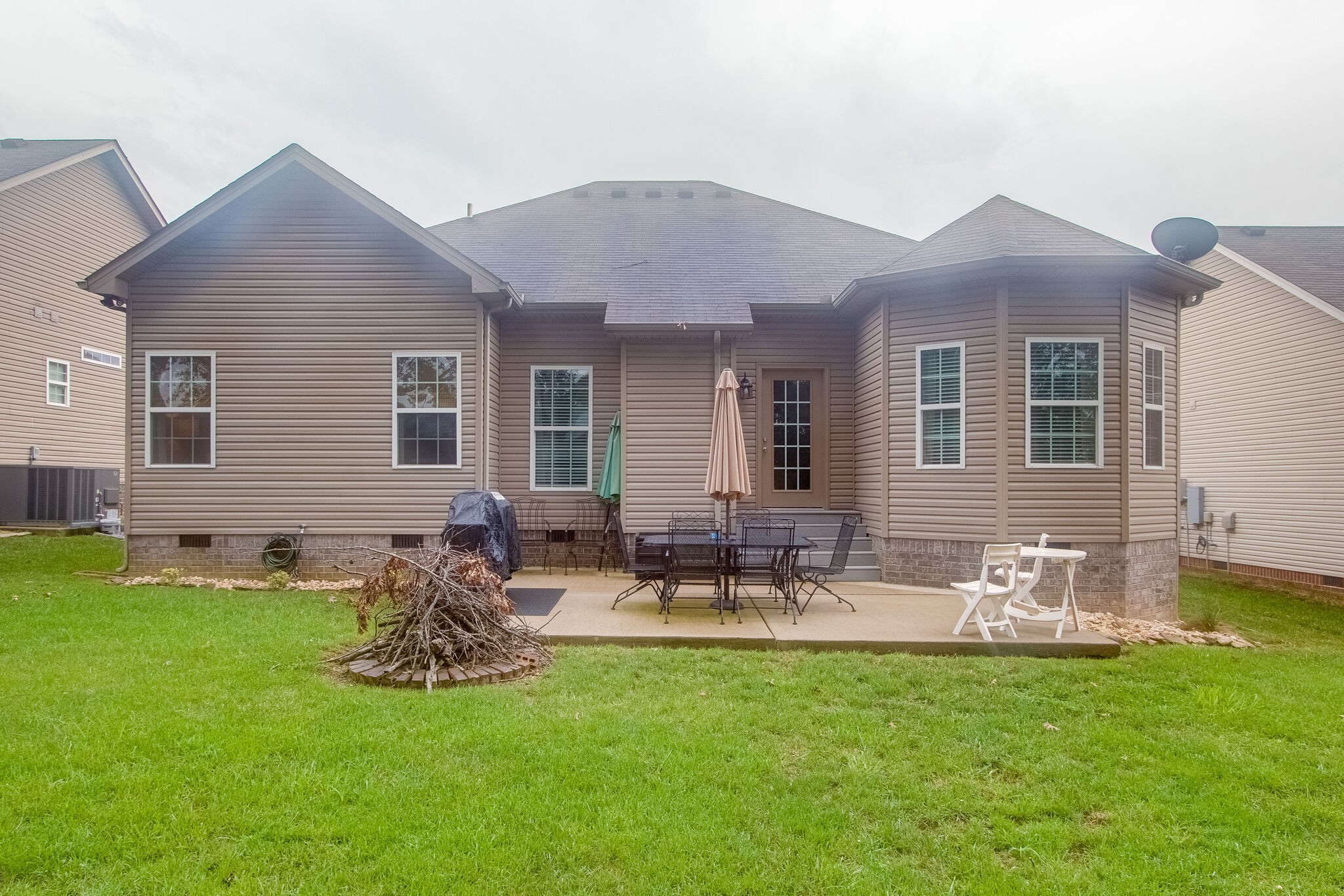 1094 Golf View Way Spring Hill, TN 37174 - Photo 26 of 26 a front view of house with yard and outdoor seating