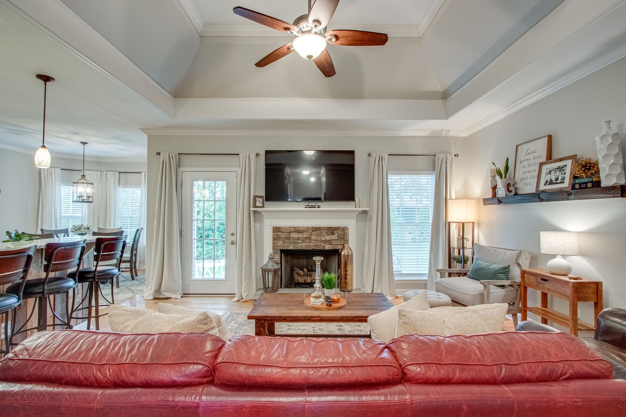 1094 Golf View Way Spring Hill, TN 37174 - Photo 5 of 26 a living room with furniture fireplace and flat screen tv