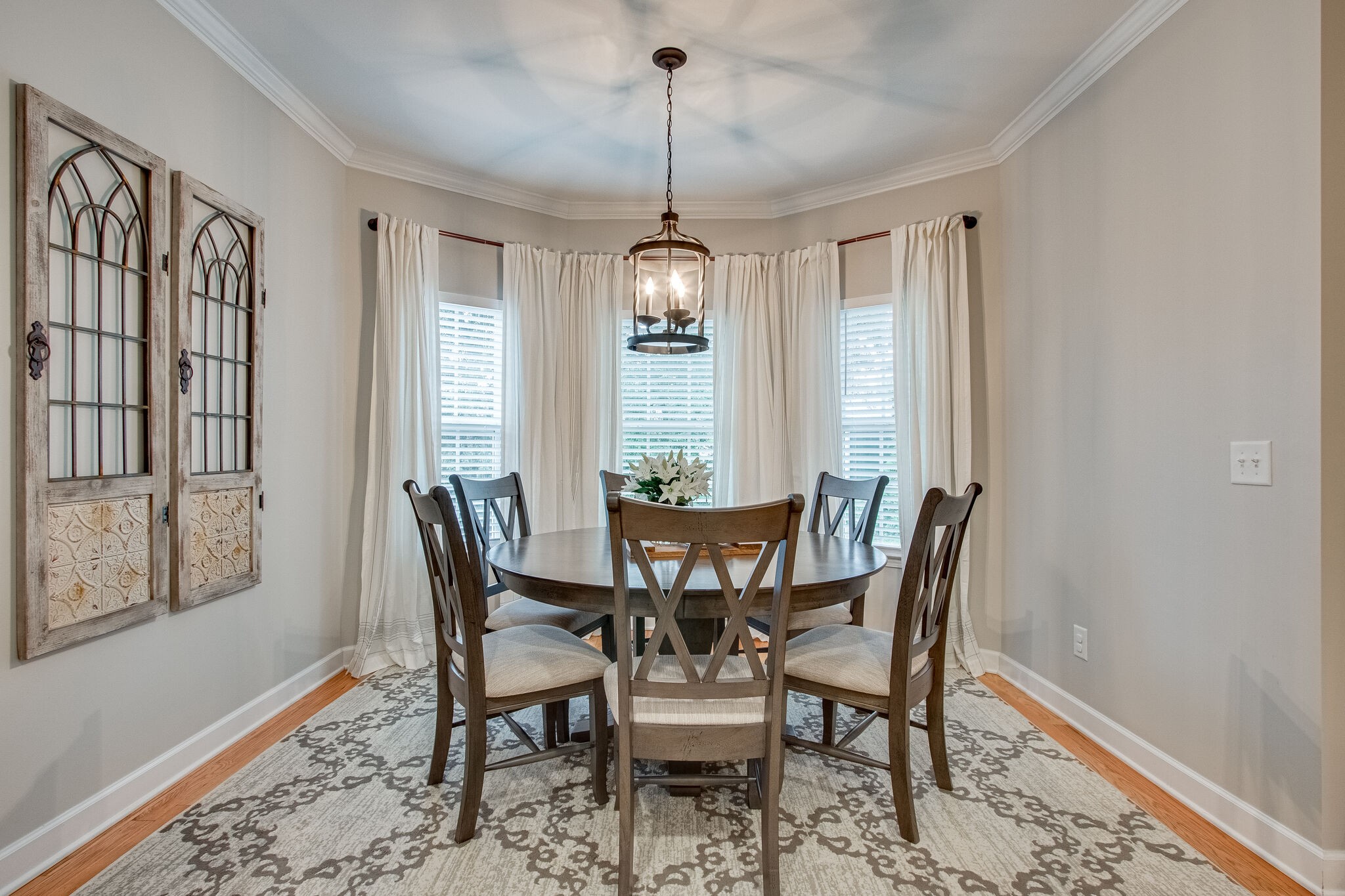 1094 Golf View Way Spring Hill, TN 37174 - Photo 9 of 26 a view of a dining room with furniture window and wooden floor