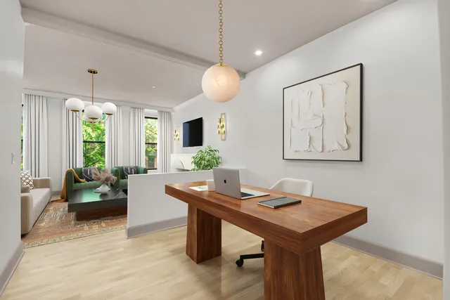 a view of a livingroom with furniture and window