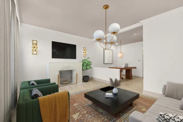 a living room with furniture a fireplace and a flat screen tv