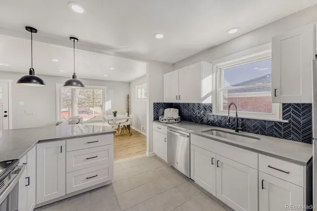 a bedroom with a bed and a potted plant