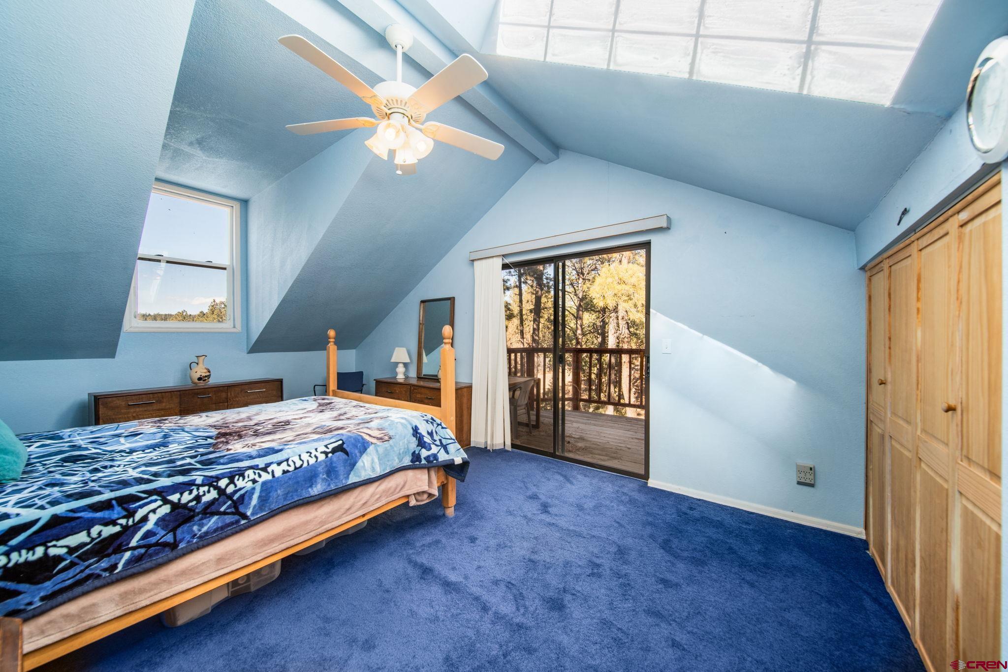 900 Spring Road Durango, CO 81303 - Photo 12 of 33 a bedroom with a bed and a window