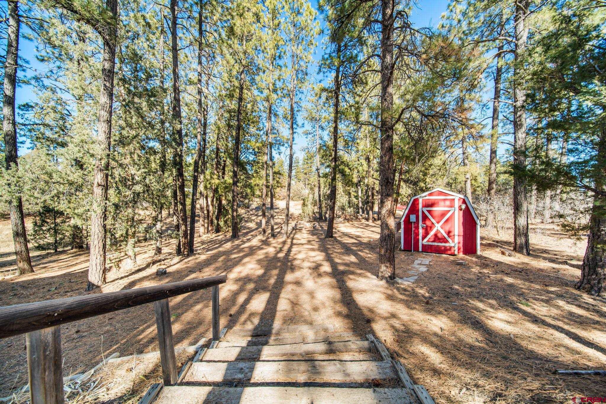 900 Spring Road Durango, CO 81303 - Photo 26 of 33 a view of a street with trees in front of it