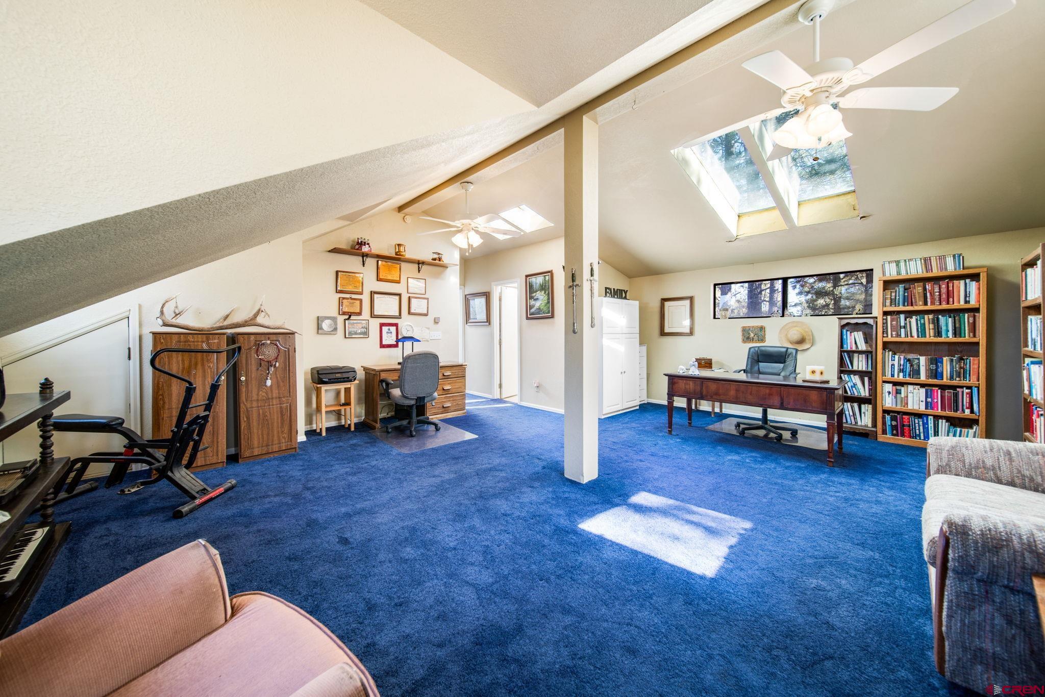 900 Spring Road Durango, CO 81303 - Photo 10 of 33 a living room with furniture and a wooden floor