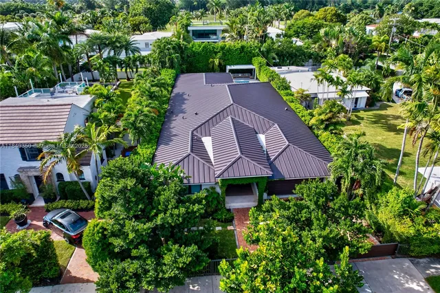 a bedroom with a bed and a lamp