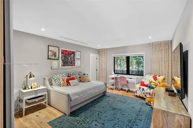 a bathroom with a sink a mirror and a bathtub