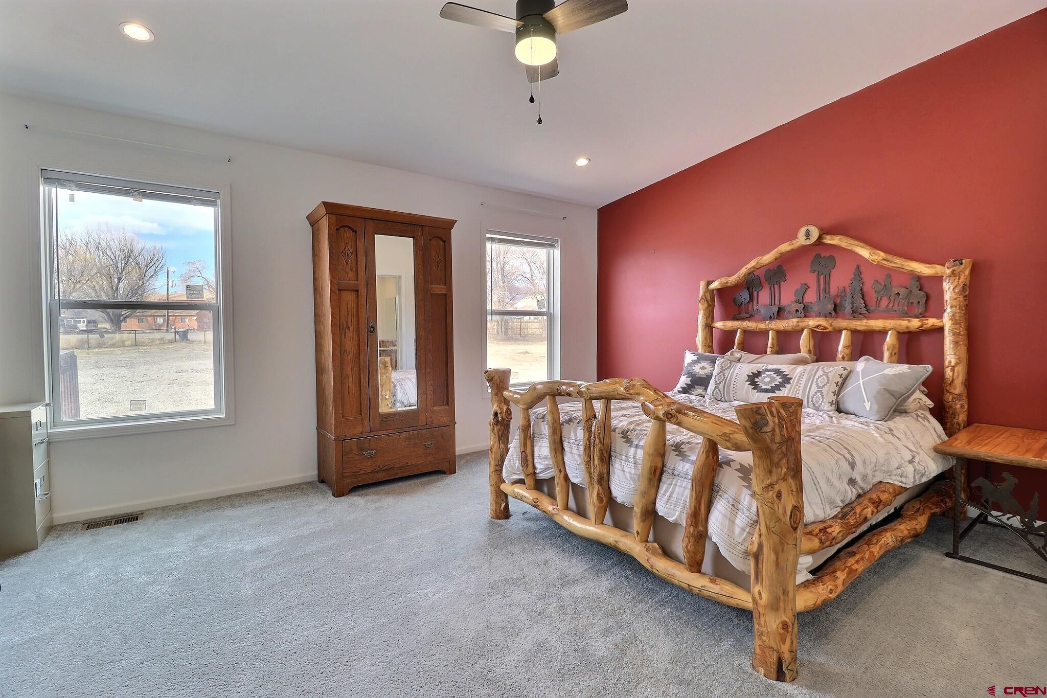 808 1525th Road Delta, CO 81416 - Photo 17 of 43 a spacious bedroom with a bed and a window