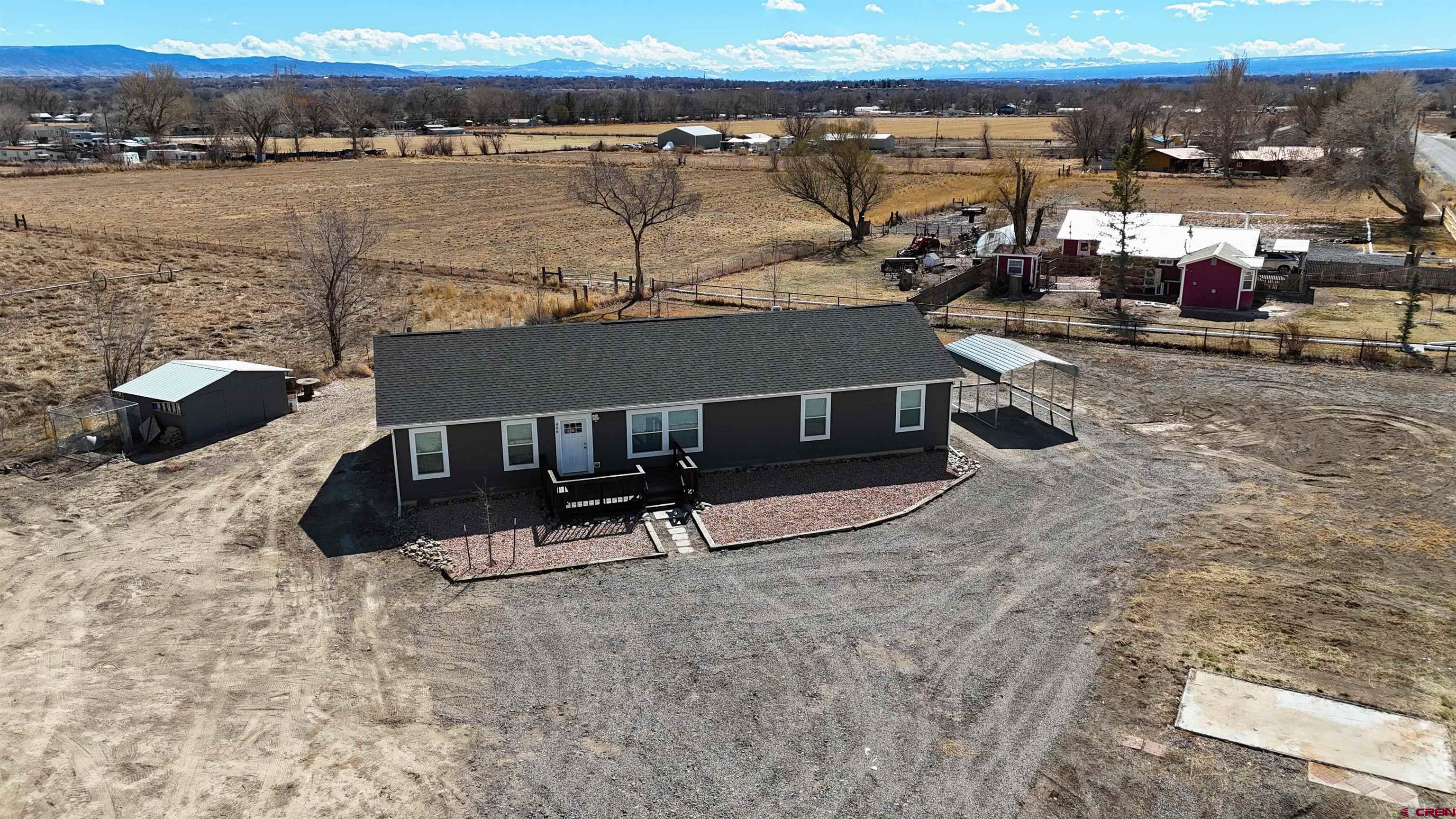 808 1525th Road Delta, CO 81416 - Photo 2 of 43 a view of a lake with a terrace