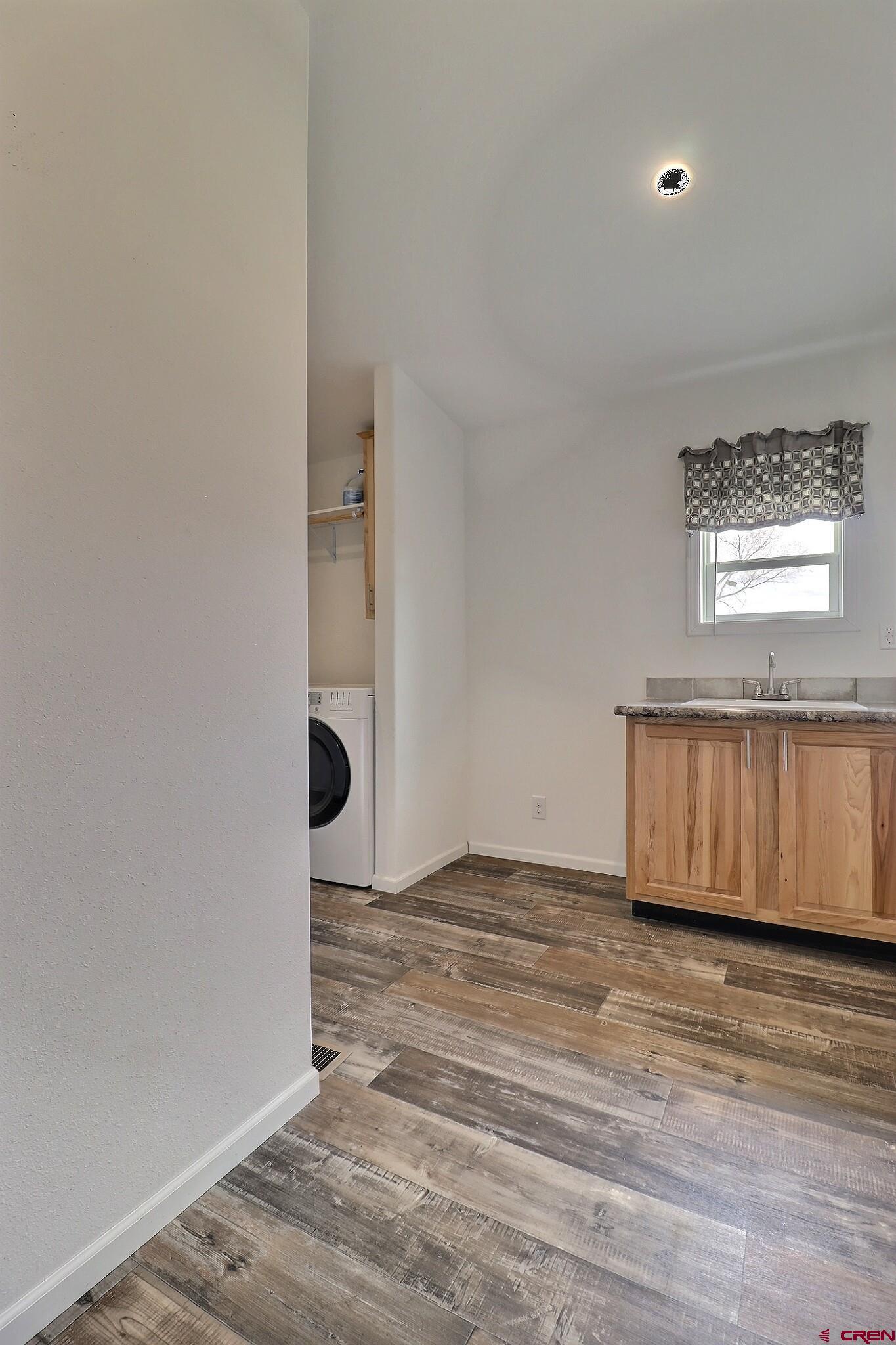 808 1525th Road Delta, CO 81416 - Photo 35 of 43 a view of entryway with wooden floor