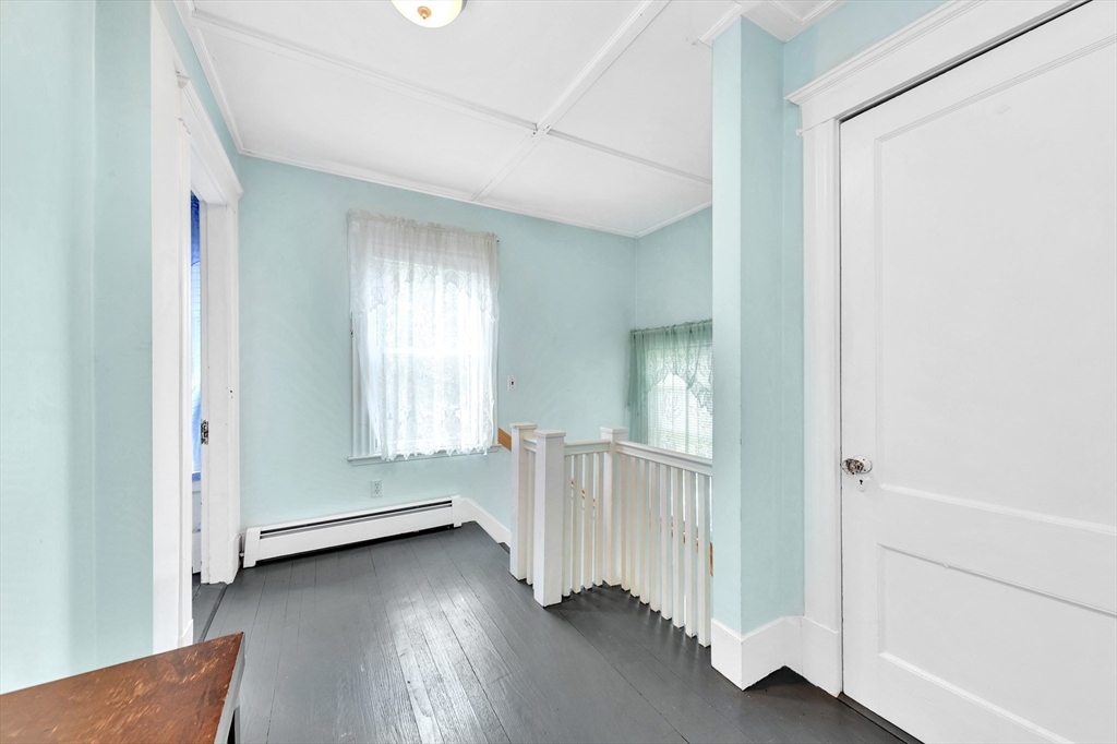 72 Hillside Avenue Lynn, MA 01902 - Photo 18 of 36 a view of livingroom with hardwood floor and window