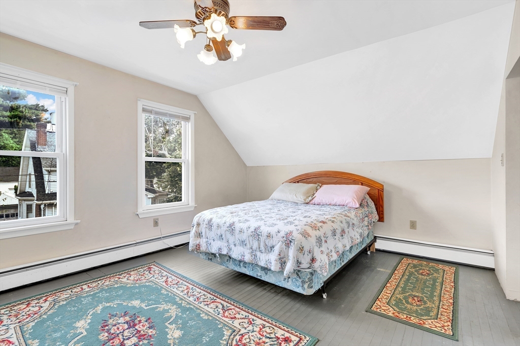 72 Hillside Avenue Lynn, MA 01902 - Photo 22 of 36 a bedroom with a bed and a window