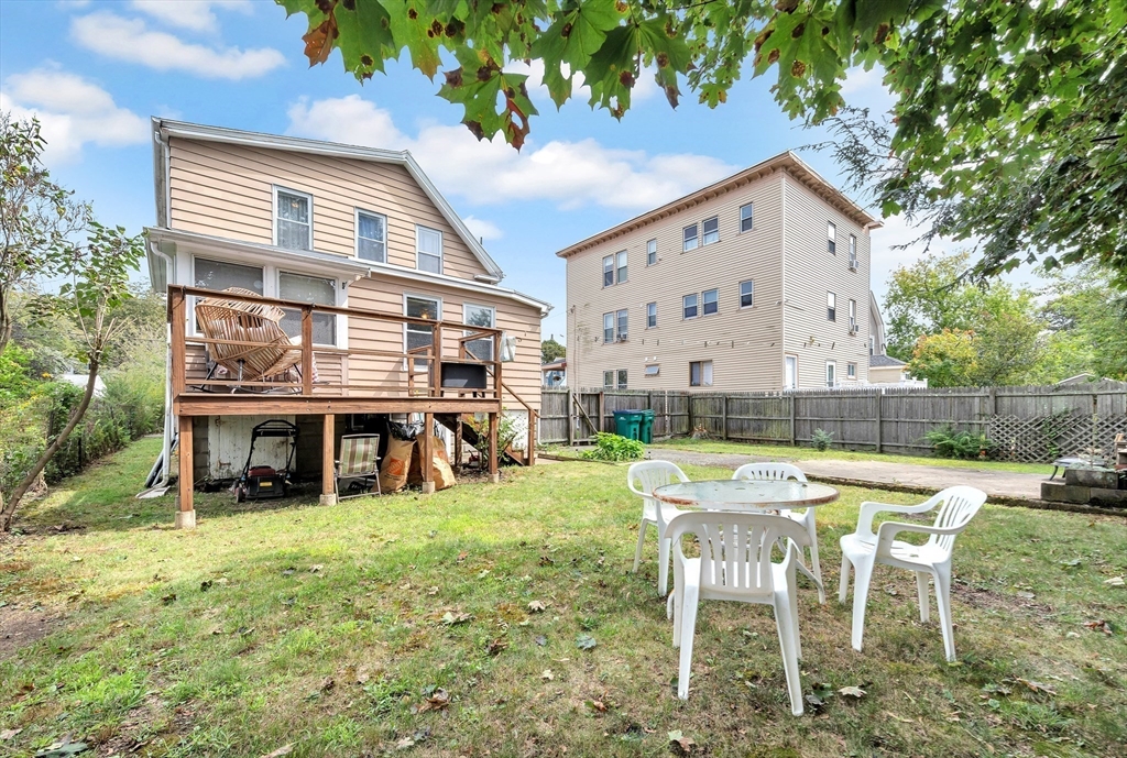 72 Hillside Avenue Lynn, MA 01902 - Photo 30 of 36 a view of a house with backyard and sitting area