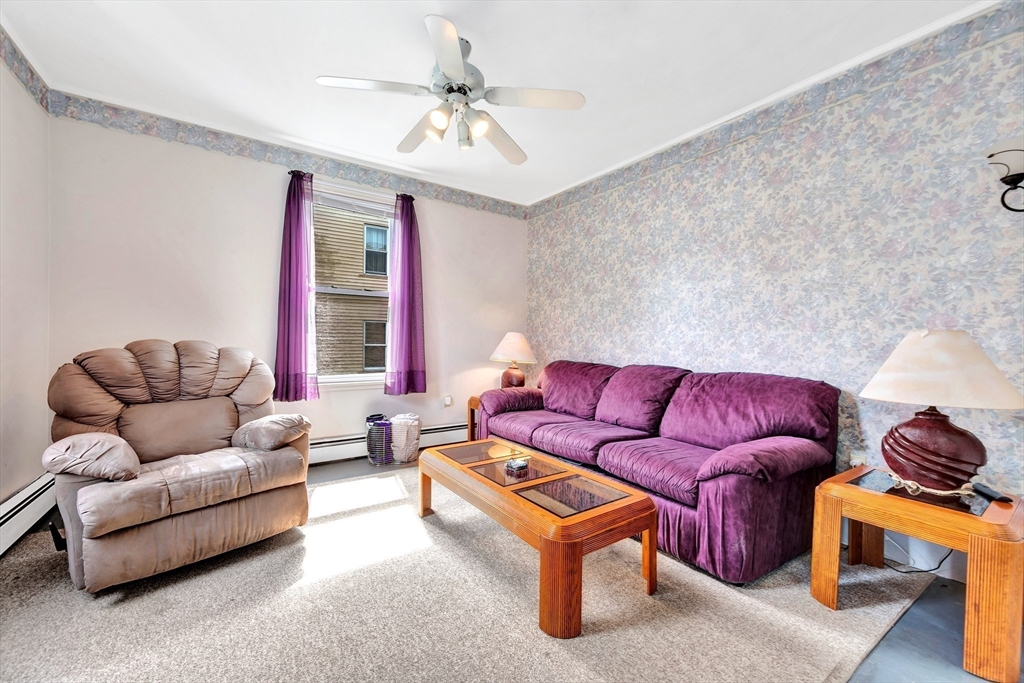 72 Hillside Avenue Lynn, MA 01902 - Photo 5 of 36 a living room with furniture