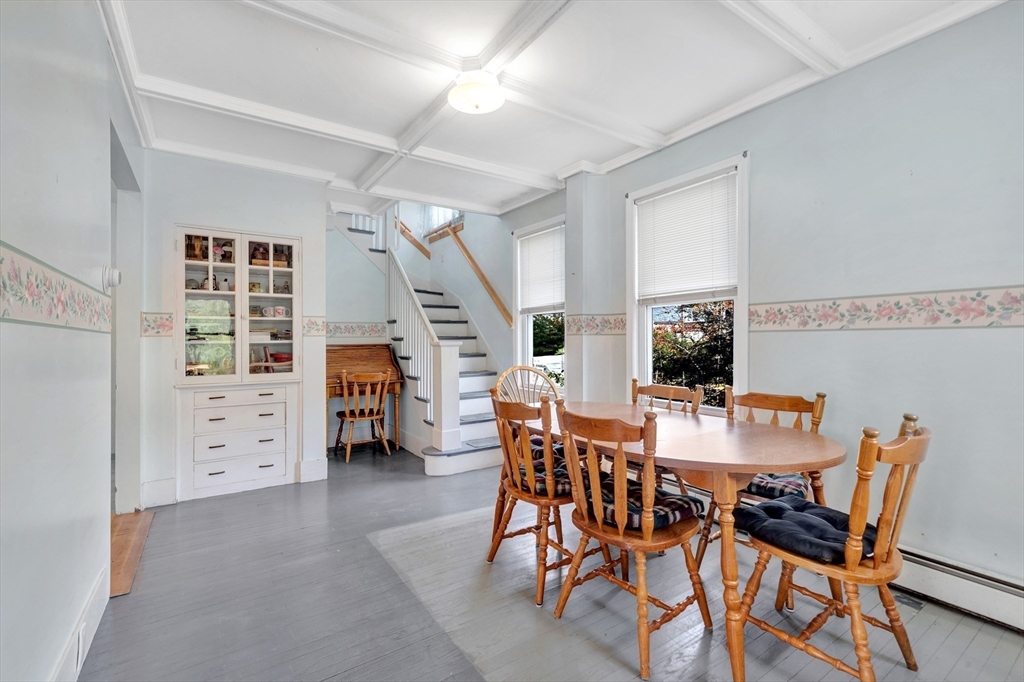 72 Hillside Avenue Lynn, MA 01902 - Photo 8 of 36 a view of a livingroom with furniture and a bookshelf