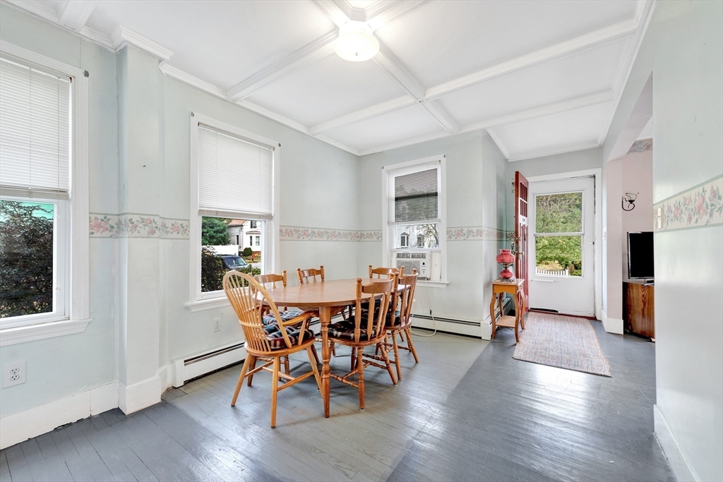 72 Hillside Avenue Lynn, MA 01902 - Photo 9 of 36 a view of a dining room with furniture and wooden floor