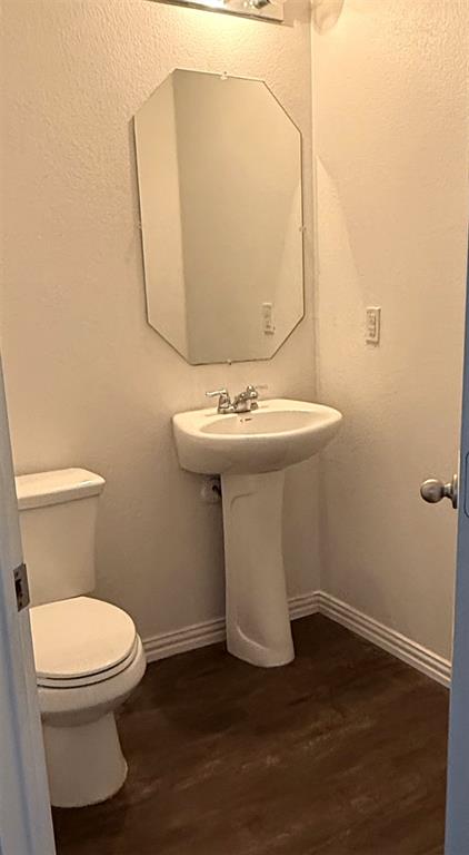 1104 Rainer Drive Princeton, TX 75407 - Photo 7 of 20 a bathroom with a sink and a toilet