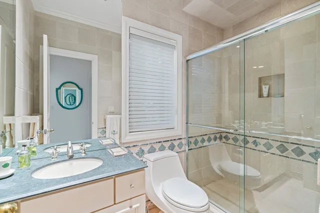 a view of a patio with chairs and a table