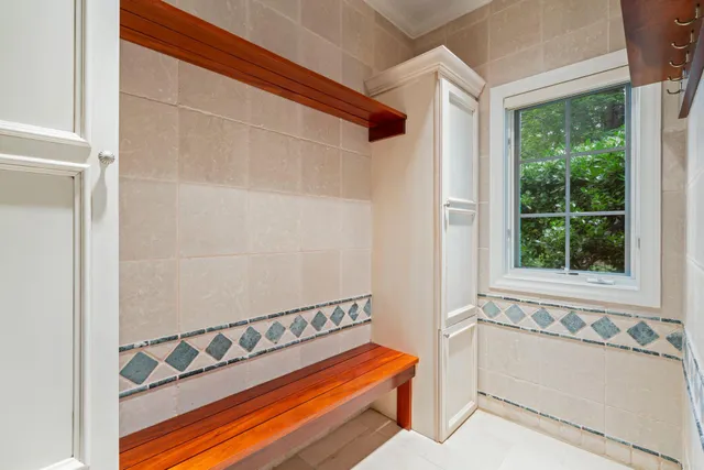 a view of a swimming pool with lounge chair