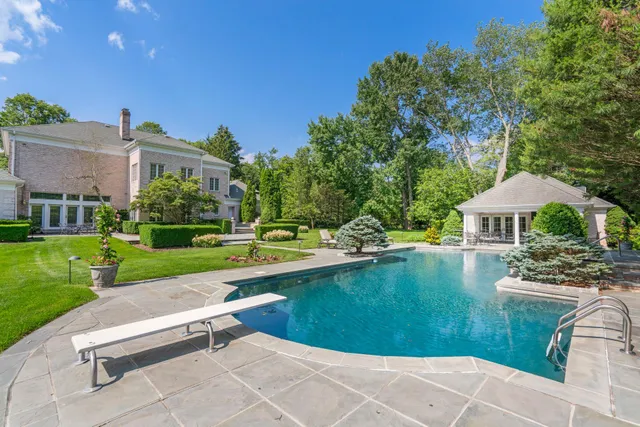 an aerial view of a house with a garden