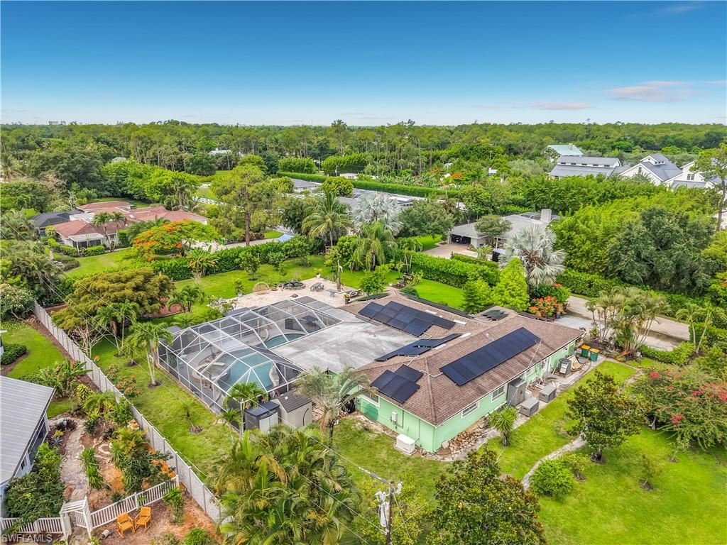 2280 Capri Court Naples, FL 34105 - Photo 28 of 49 an aerial view of a house with a yard