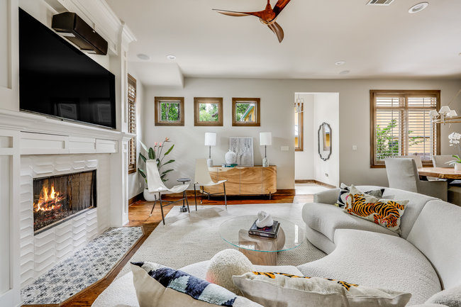 2913 Cherry Lane, Unit A Austin, TX 78703 - Photo 1 of 19 a living room with furniture fireplace and flat screen tv