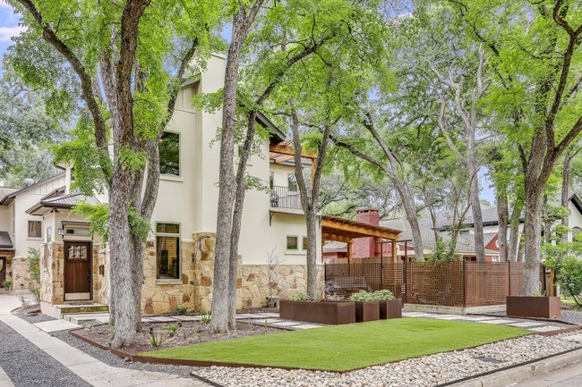 2913 Cherry Lane, Unit A Austin, TX 78703 - Photo 18 of 19 a front view of a house with a yard