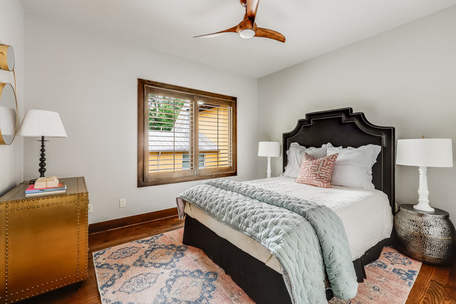 2913 Cherry Lane, Unit A Austin, TX 78703 - Photo 9 of 19 a bedroom with bed and a window