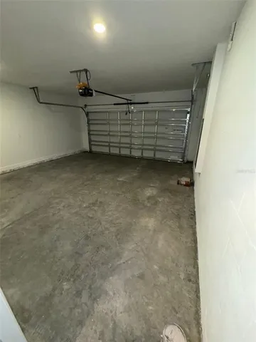 a picture of a bathroom with a granite countertop shower