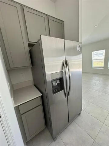 a bathroom with a shower and a sink