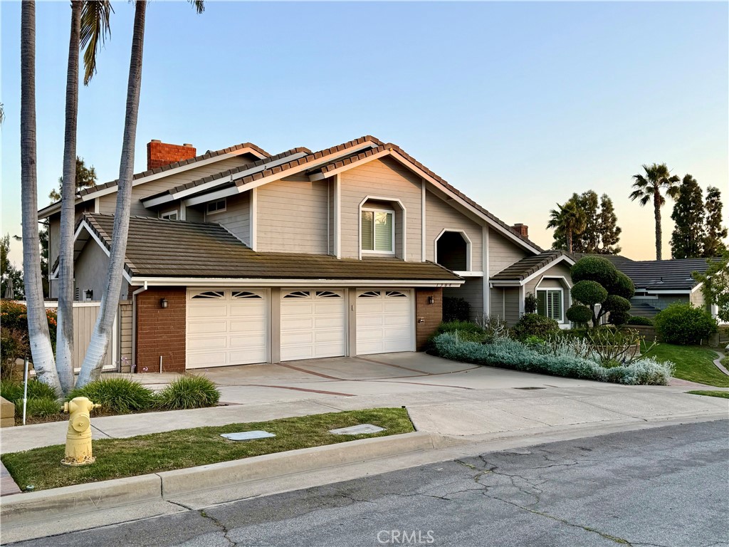1364 Armstead Lane Fullerton, CA 92833 - Photo 1 of 21 a front view of a house with a garden and plants