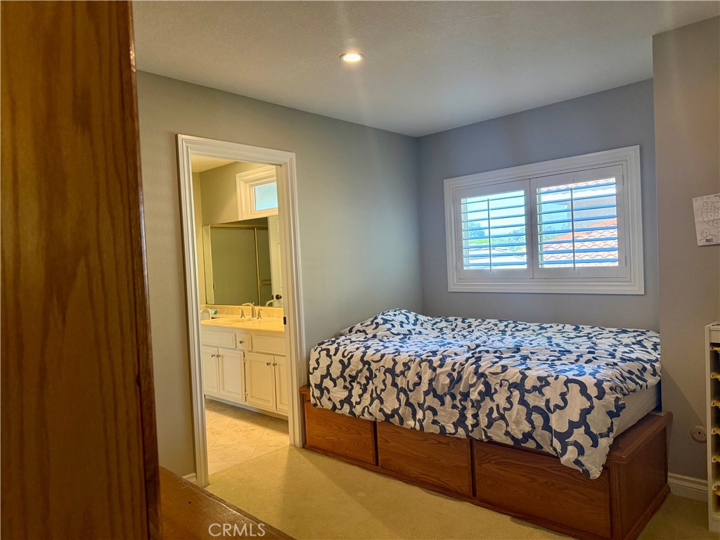 1364 Armstead Lane Fullerton, CA 92833 - Photo 16 of 21 a bedroom with a bed and a window