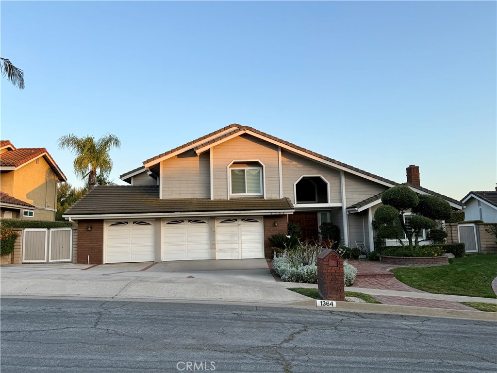 1364 Armstead Lane Fullerton, CA 92833 - Photo 2 of 21 a front view of a house with garage