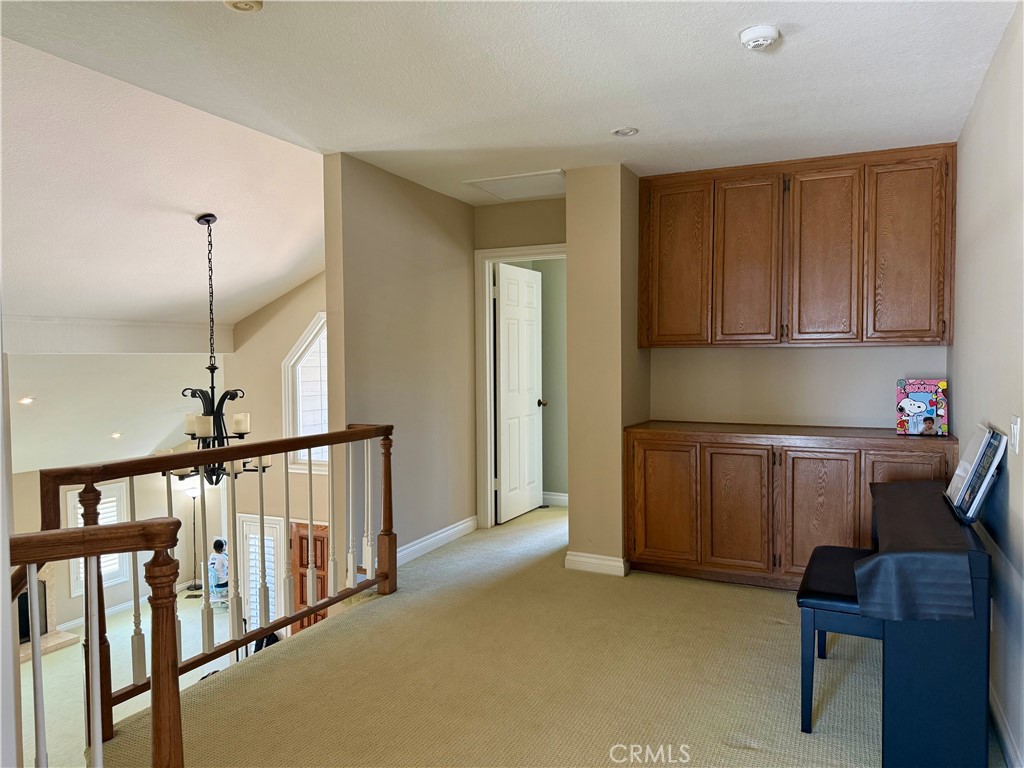 1364 Armstead Lane Fullerton, CA 92833 - Photo 5 of 21 a workspace with furniture window and wooden floor