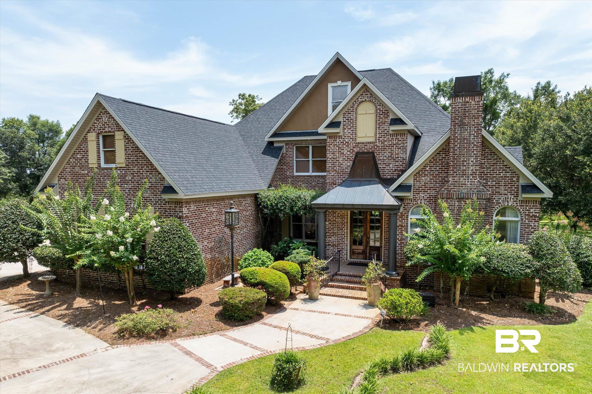 2905 Riverview Pointe Drive South Theodore, AL 36582 - Photo 1 of 44 View of front of property with brick siding, a shingled roof, a chimney, and a front yard