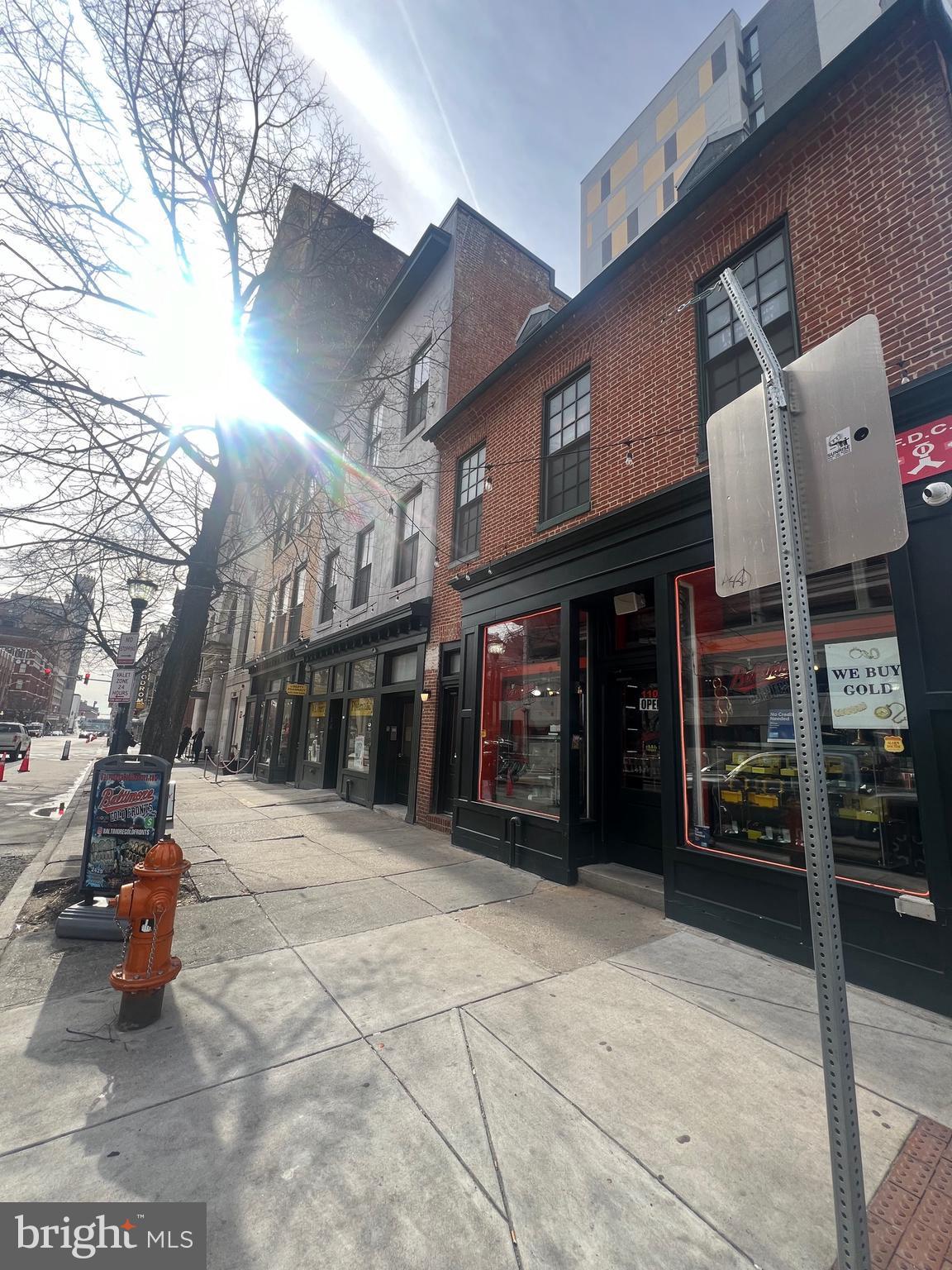 106 North Eutaw Street, Unit 3A Baltimore, MD 21201 - Photo 1 of 6 a view of a building with the street