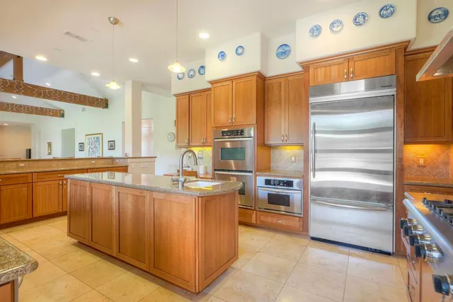 a bed room with a bed and a fish aquarium