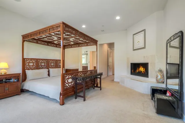 a view of a lake with a house in the background