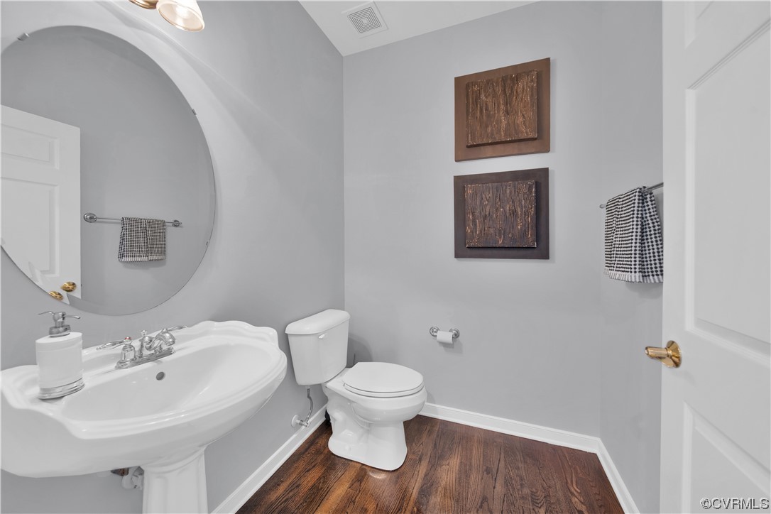 6418 Rivershook Terrace Moseley, VA 23120 - Photo 16 of 44 a bathroom with a sink and a mirror