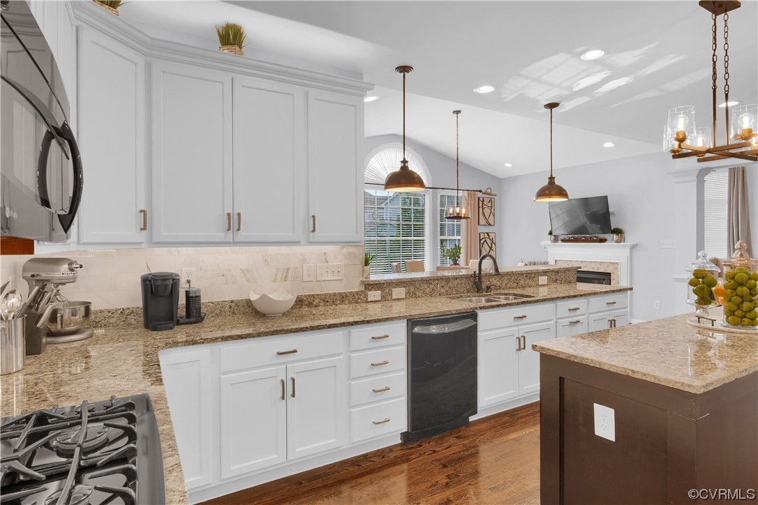 6418 Rivershook Terrace Moseley, VA 23120 - Photo 23 of 44 a kitchen with granite countertop a sink a stove and cabinets