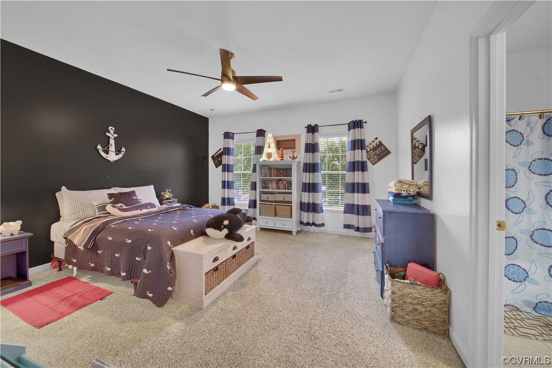 6418 Rivershook Terrace Moseley, VA 23120 - Photo 31 of 44 a bedroom with a bed and dresser