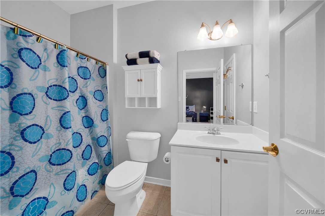 6418 Rivershook Terrace Moseley, VA 23120 - Photo 32 of 44 a bathroom with a sink and mirror with toilet