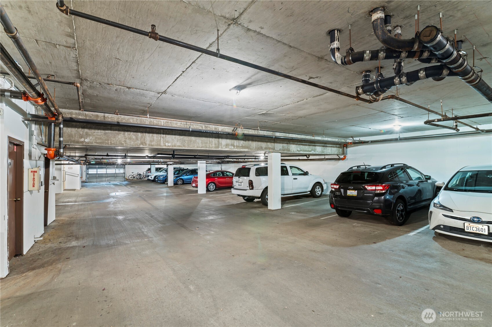 707 North 130th Street, Unit B204 Seattle, WA 98133 - Photo 21 of 21 a view of parking garage with cars