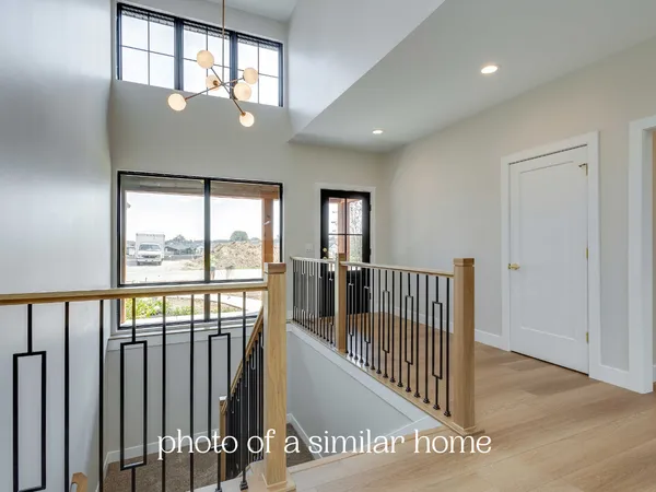 a view of staircase with lots of windows