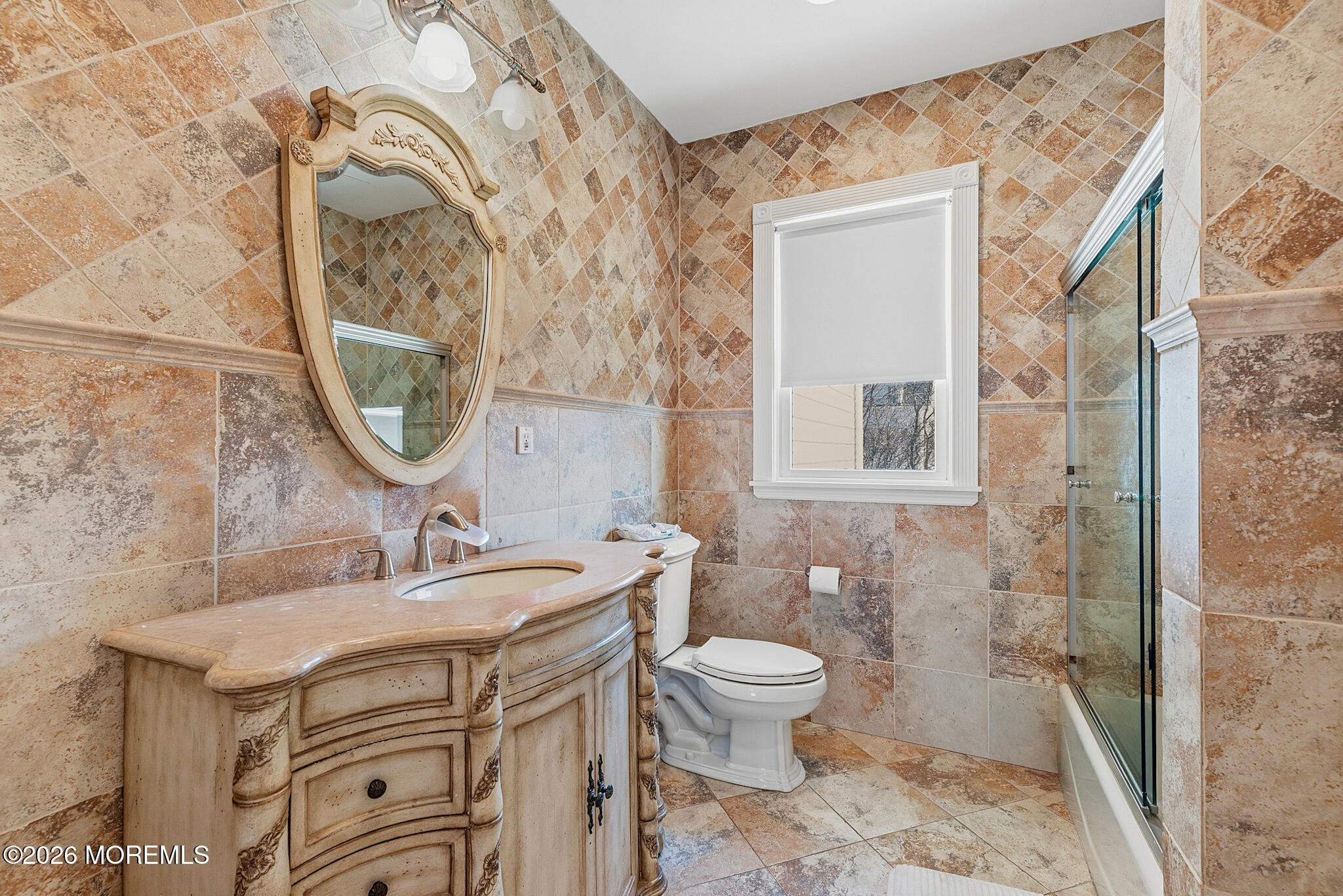 48 Neptune Avenue Deal, NJ 07723 - Photo 12 of 32 a bathroom with a sink toilet and shower